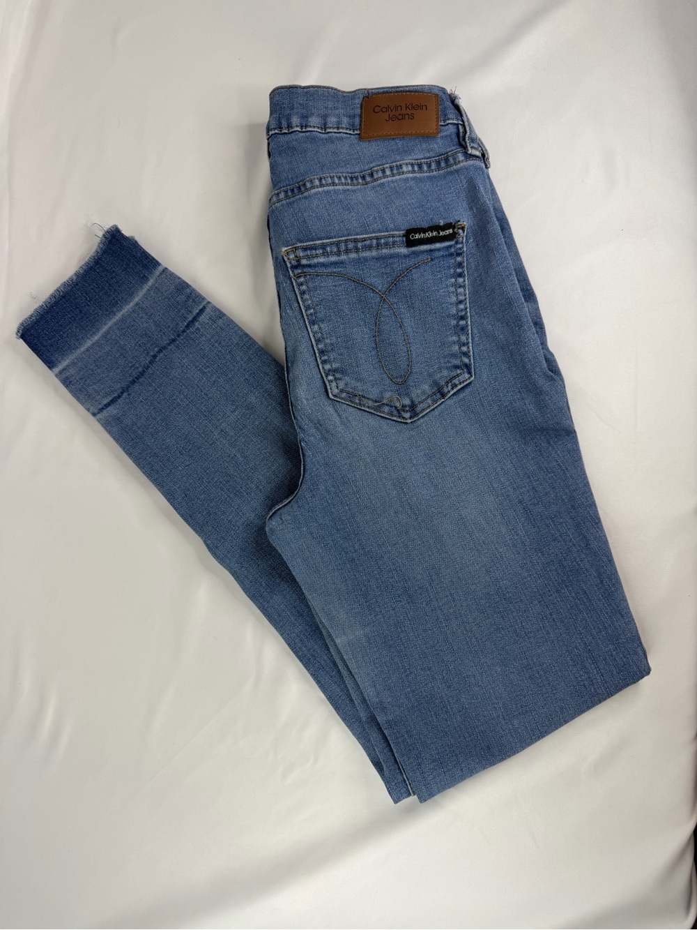 Calvin Klein Light Blue Denim Jeans with Brown Leather Patch Size 4